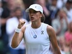 Iga Swiatek celebrates winning her fourth round match against Belinda Bencic