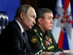 Russian President Vladimir Putin and Chief of the General Staff of Russian Armed Forces Valery Gerasimov. (Reuters)