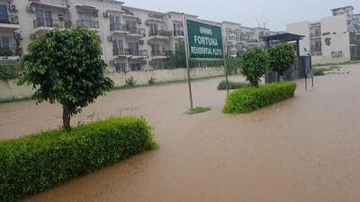 Rainwater floods several condos across Gurugram Rainwater floods several condos across Gurugram