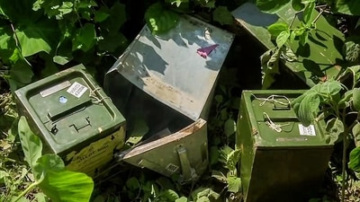 Three ballot boxes are found abandoned in the drain after violence erupted in the aftermath of West Bengal Panchayat elections in Murshidabad on Sunday. (ANI Photo) (ANI) Three ballot boxes are found abandoned in the drain after violence erupted in the aftermath of West Bengal Panchayat elections in Murshidabad on Sunday. (ANI Photo) (ANI)