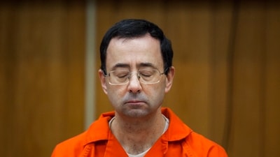 Larry Nassar listens during his sentencing at Eaton County Circuit Court in Charlotte, Mich., Feb. 5, 2018. Nassar, who was convicted of sexually abusing female gymnasts including Olympic medalists, was stabbed multiple times during an altercation with another inmate at a federal prison in Florida on Sunday, July 9, 2023. (AP) Larry Nassar listens during his sentencing at Eaton County Circuit Court in Charlotte, Mich., Feb. 5, 2018. Nassar, who was convicted of sexually abusing female gymnasts including Olympic medalists, was stabbed multiple times during an altercation with another inmate at a federal prison in Florida on Sunday, July 9, 2023. (AP)