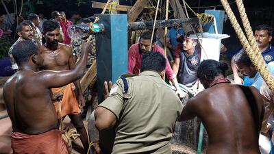 Firefighters and locals attempt to rescue a 55-year-old man who was trapped in a well in Vizhinjam area of Thiruvananthapuram on Saturday (PTI File) Firefighters and locals attempt to rescue a 55-year-old man who was trapped in a well in Vizhinjam area of Thiruvananthapuram on Saturday (PTI File)