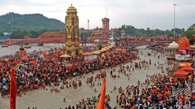 Devotees offered prayers at the Nageshwar Shiv temple in Kanpur and the Daksha Prajapati Shiv temple in Haridwar. (AFP) Devotees offered prayers at the Nageshwar Shiv temple in Kanpur and the Daksha Prajapati Shiv temple in Haridwar. (AFP)