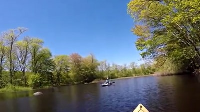 One of the girls initially fell into a deeper part of the pond near its confluence with a local river, when the other daughter jumped in to save her (Maine Yakker screenshot/YouTube) One of the girls initially fell into a deeper part of the pond near its confluence with a local river, when the other daughter jumped in to save her (Maine Yakker screenshot/YouTube)