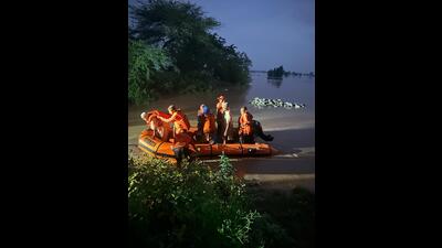 NDRF teams carrying rescue operations in Janiyan village in Jalandhar district on Monday NDRF teams carrying rescue operations in Janiyan village in Jalandhar district on Monday