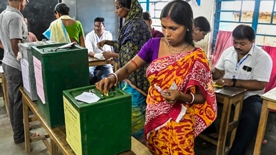 Women cast their votes for Panchayat elections at a polling station, in Nadia district of West Bengal, Saturday. (PTI) Women cast their votes for Panchayat elections at a polling station, in Nadia district of West Bengal, Saturday. (PTI)