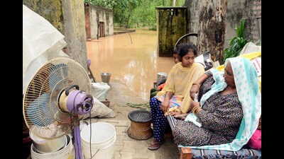 Residents of Phillaur move out their essentials as rainwater enters their home due to rise in water level following heavy rainfall, in Jalandhar on Monday. (ANI) Residents of Phillaur move out their essentials as rainwater enters their home due to rise in water level following heavy rainfall, in Jalandhar on Monday. (ANI)