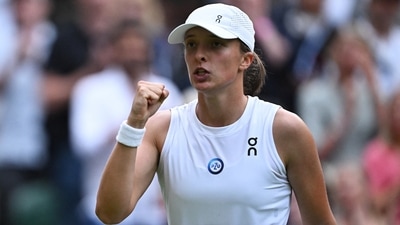 Iga Swiatek celebrates winning her fourth round match against Belinda Bencic (REUTERS)