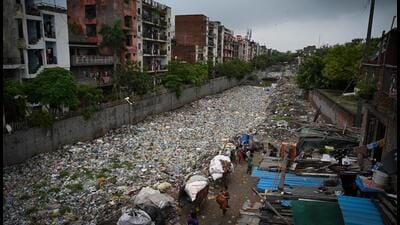 Taimoor Nagar drain filled with garbage and encroachments on one end. (Sanchit Khanna/HT Photo) Taimoor Nagar drain filled with garbage and encroachments on one end. (Sanchit Khanna/HT Photo)