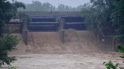 Two floodgates of Sukhna Lake were opened on Sunday after its water levels crossed the danger mark in Chandigarh. (Sant Arora/ HT Photo) Two floodgates of Sukhna Lake were opened on Sunday after its water levels crossed the danger mark in Chandigarh. (Sant Arora/ HT Photo)