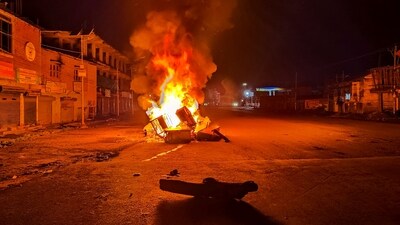 Tyres and construction materials set on fire by miscreants amid ongoing ethnic violence in Manipur, in Imphal East district, Friday. (PTI) (HT_PRINT) Tyres and construction materials set on fire by miscreants amid ongoing ethnic violence in Manipur, in Imphal East district, Friday. (PTI) (HT_PRINT)