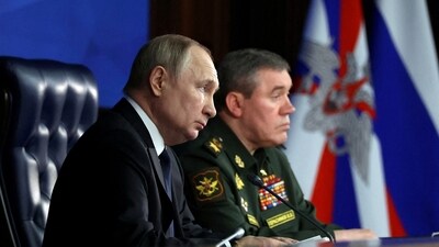 Russian President Vladimir Putin and Chief of the General Staff of Russian Armed Forces Valery Gerasimov. (Reuters)