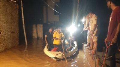 A rescue operation is underway in the residential areas along Tangri river in Ambala Cantt, Punjab, amid heavy rainfall. (HT Photo) A rescue operation is underway in the residential areas along Tangri river in Ambala Cantt, Punjab, amid heavy rainfall. (HT Photo)
