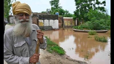 With the level of Buddha Nullah remaining to be at an alarming level for the third consecutive day, sanitation in the low-lying areas has been severely hit. Sewage mixed rain water has accumulated on the streets and roads. As manholes and road gullies in the areas are flowing in reverse direction, the residents fear an outbreak of vector-borne diseases. (Gurpreet Singh) With the level of Buddha Nullah remaining to be at an alarming level for the third consecutive day, sanitation in the low-lying areas has been severely hit. Sewage mixed rain water has accumulated on the streets and roads. As manholes and road gullies in the areas are flowing in reverse direction, the residents fear an outbreak of vector-borne diseases. (Gurpreet Singh)