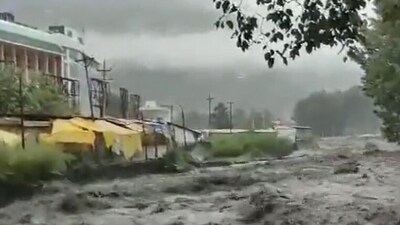As continuous rainfall persists in Himachal Pradesh, the swollen Lagghati Khad river is seen in visuals from Kullu Bus Stand. (ANI) As continuous rainfall persists in Himachal Pradesh, the swollen Lagghati Khad river is seen in visuals from Kullu Bus Stand. (ANI)