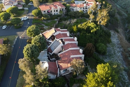 A view shows damaged houses, which were evacuated due to a growing fissure causing a landslide, in the Rolling Hills Estates, California, (REUTERS)