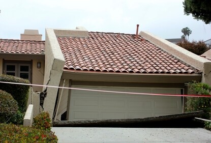 A house in Rolling Hills Estates is severely damaged after a landslide on the Palos Verdes Peninsula in Los Angeles County, (AP) A house in Rolling Hills Estates is severely damaged after a landslide on the Palos Verdes Peninsula in Los Angeles County, (AP)
