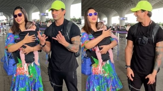 Bipasha Basu, Karan Singh Grover with their daughter Devi at Mumbai airport,