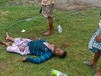A body claimed to be of a TMC activist after a clash among rival political groups outside a polling station during panchayat polls at Basanti in West Bengal's South 24 Parganas district on July 8. A body claimed to be of a TMC activist after a clash among rival political groups outside a polling station during panchayat polls at Basanti in West Bengal's South 24 Parganas district on July 8.