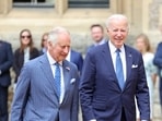 Britain's King Charles and US president Joe Biden walk together in the Quadrangle at  Windsor Castle.