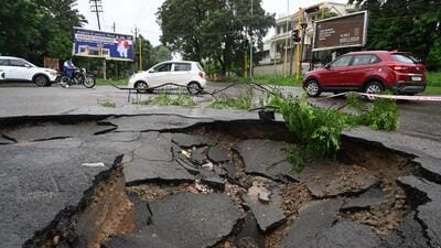 A road cave in seen near Sports Complex, Mohali, after heavy rain on Monday. (Sanjeev Sharma/HT) A road cave in seen near Sports Complex, Mohali, after heavy rain on Monday. (Sanjeev Sharma/HT)