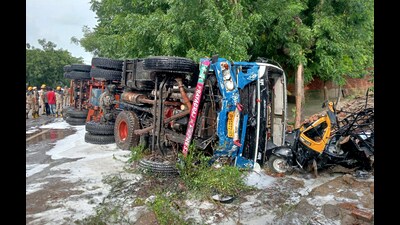 A tempo truck got overturned after hitting a gas tanker, in Pratapgarh. The death toll in the mishap has reached 12 following the death of three more people late on Monday night. (FILE PHOTO) A tempo truck got overturned after hitting a gas tanker, in Pratapgarh. The death toll in the mishap has reached 12 following the death of three more people late on Monday night. (FILE PHOTO)