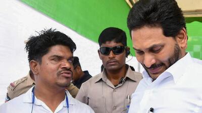 Andhra Pradesh chief minister YS Jagan Mohan Reddy listens to the problem of a specially-abled person (YSR Congress Party) Andhra Pradesh chief minister YS Jagan Mohan Reddy listens to the problem of a specially-abled person (YSR Congress Party)