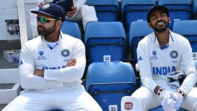 India's captain Rohit Sharma (L) looks on during a break in play (AFP) India's captain Rohit Sharma (L) looks on during a break in play (AFP)