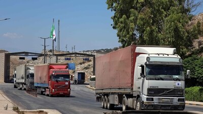The first United Nations aid convoy through the Bab al-Hawa border crossing with Turkey. (AFP) The first United Nations aid convoy through the Bab al-Hawa border crossing with Turkey. (AFP)