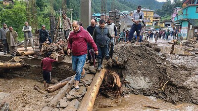 Former Himachal Pradesh chief minister Jai Ram Thakur inspects the flood-affected areas in Mandi on Tuesday. (PTI) Former Himachal Pradesh chief minister Jai Ram Thakur inspects the flood-affected areas in Mandi on Tuesday. (PTI)