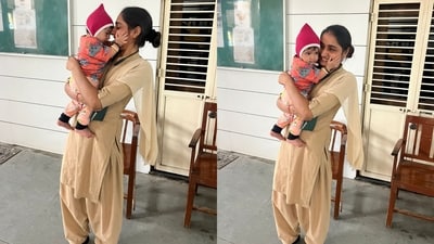 Police constable Dayaben Jitubhai comforting the six-month-old infant. (Twitter/@AhmedabadPolice) Police constable Dayaben Jitubhai comforting the six-month-old infant. (Twitter/@AhmedabadPolice)
