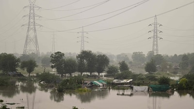 The Yamuna River breached the danger mark of 205.33 metres and shot up to 206. 24 meters as Haryana released more water into the river from the Hathnikund barrage amid rains across northwest India. (AFP) The Yamuna River breached the danger mark of 205.33 metres and shot up to 206. 24 meters as Haryana released more water into the river from the Hathnikund barrage amid rains across northwest India. (AFP)