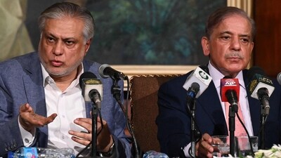 Pakistan's Prime Minister Shehbaz Sharif (R) and Pakistan's Finance Minister Ishaq Dar (L) address a press conference in Lahore. (AFP) Pakistan's Prime Minister Shehbaz Sharif (R) and Pakistan's Finance Minister Ishaq Dar (L) address a press conference in Lahore. (AFP)