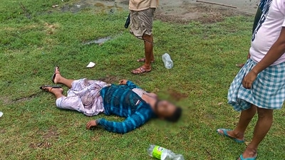 A body claimed to be of a TMC activist after a clash among rival political groups outside a polling station during panchayat polls at Basanti in West Bengal's South 24 Parganas district on July 8. (PTI) A body claimed to be of a TMC activist after a clash among rival political groups outside a polling station during panchayat polls at Basanti in West Bengal's South 24 Parganas district on July 8. (PTI)