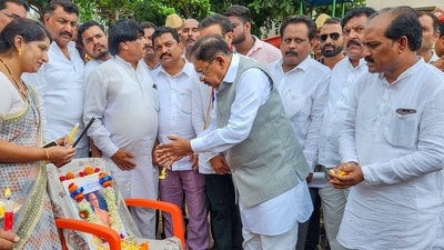 Karnataka Home Minister G. Parameshwara offers floral tribute to Jain saint Swami Acharya Kamakumar Nandi near Hubballi on Monday. (PTI) Karnataka Home Minister G. Parameshwara offers floral tribute to Jain saint Swami Acharya Kamakumar Nandi near Hubballi on Monday. (PTI)