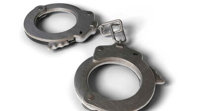 A 61-page official document and a mobile phone were seized from the accused's possession.