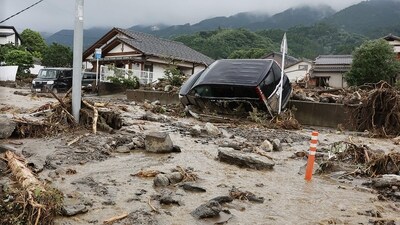 Mud and debris cover a street following a flood in Tanushimarumachi in the city of Kurume, Fukuoka prefecture, on July 10, 2023, after heavy rains hit wide areas of Kyushu island in Japan. (AFP) Mud and debris cover a street following a flood in Tanushimarumachi in the city of Kurume, Fukuoka prefecture, on July 10, 2023, after heavy rains hit wide areas of Kyushu island in Japan. (AFP)