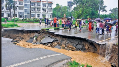 The road to Mansa Devi broken amid heavy rain in Panchkula on Monday. (Sant Arora/HT) The road to Mansa Devi broken amid heavy rain in Panchkula on Monday. (Sant Arora/HT)
