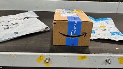 Packages are transported on a conveyor belt at the Amazon warehouse, busy on Prime Day, in Melville, New York, U.S., June 11, 2023. REUTERS/Soren Larson (REUTERS)
