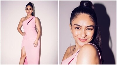 Mrunal Thakur is an absolute fashionista. The actor keeps slaying fashion goals like a pro with snippets from her fashion diaries on her Instagram profile on a regular basis. From acing casual fashion to showing us snippets from her ethnic diaries to setting fresh formal fashion goals, Mrunal can do it all. The actor, a day back, shared a string of pictures of herself looking stunning in a gown. (Instagram/@mrunalthakur) Mrunal Thakur is an absolute fashionista. The actor keeps slaying fashion goals like a pro with snippets from her fashion diaries on her Instagram profile on a regular basis. From acing casual fashion to showing us snippets from her ethnic diaries to setting fresh formal fashion goals, Mrunal can do it all. The actor, a day back, shared a string of pictures of herself looking stunning in a gown. (Instagram/@mrunalthakur)