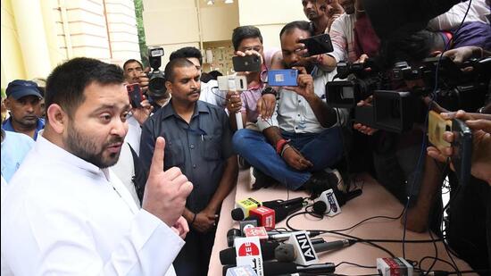 Deputy CM Tejashwi Yadav addresses media persons outside Bihar Assembly. (Santosh Kumar/HT)