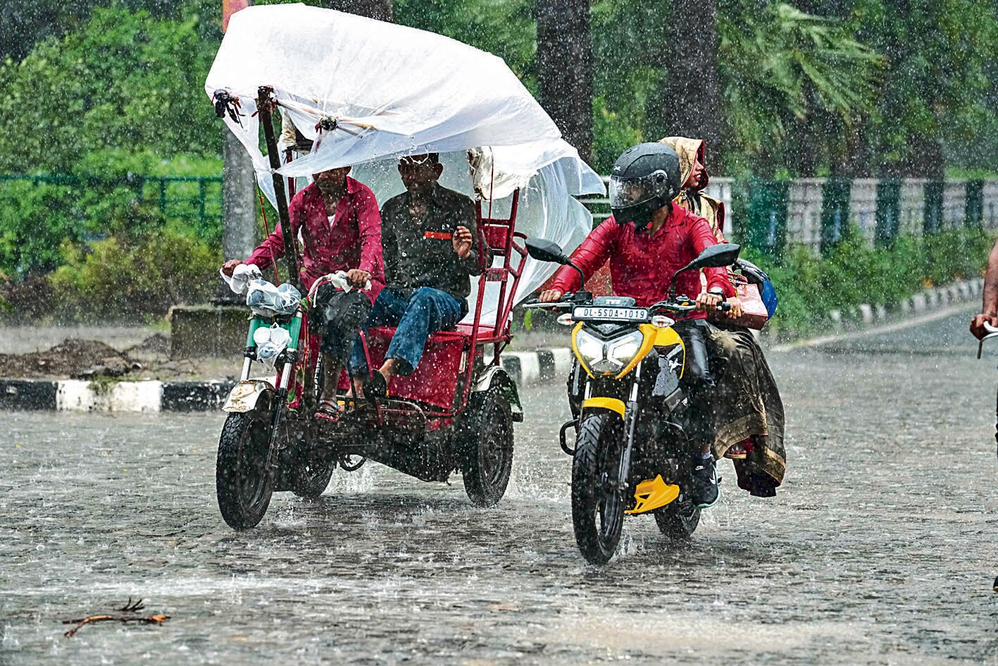Rainy day hacks: Battling traffic jams, seekers explore strategies to dodge the downpour. (Photo: Kamal Kishore/PTI) Rainy day hacks: Battling traffic jams, seekers explore strategies to dodge the downpour. (Photo: Kamal Kishore/PTI)