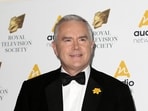 FILE - Journalist Huw Edwards poses for photographers upon arrival at the Royal Television Society Programme Awards at the Grosvenor Hotel in London, Tuesday, March 21, 2017. London police say there's no evidence that a BBC presenter who allegedly paid a teenager for sexually explicit photos committed a crime. The Metropolitan police issued the statement Wednesday, July 12, 2023 as the wife of Huw Edwards identified him as the presenter. (AP Photos/Tim Ireland, File) FILE - Journalist Huw Edwards poses for photographers upon arrival at the Royal Television Society Programme Awards at the Grosvenor Hotel in London, Tuesday, March 21, 2017. London police say there's no evidence that a BBC presenter who allegedly paid a teenager for sexually explicit photos committed a crime. The Metropolitan police issued the statement Wednesday, July 12, 2023 as the wife of Huw Edwards identified him as the presenter. (AP Photos/Tim Ireland, File)