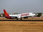 A SpiceJet passenger Boeing 737-800 aircraft takes off from Sardar Vallabhbhai Patel international airport in Ahmedabad.