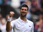 Serbia's Novak Djokovic celebrates winning against Russia's Andrey Rublev Serbia's Novak Djokovic celebrates winning against Russia's Andrey Rublev