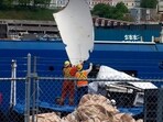 Debris from the Titan submersible, recovered from the ocean floor near the wreck of the Titanic, is unloaded from the ship Horizon Arctic at the Canadian Coast Guard pier in St. John's, Newfoundland (Paul Daly/The Canadian Press via AP, File)
