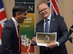 Anthony Albanese (L) displays a picture that shows Jonny Bairstow being stumped Anthony Albanese (L) displays a picture that shows Jonny Bairstow being stumped