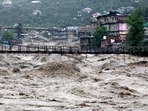 A view shows the overflowing river Beas following heavy rains in Kullu district in the northern state of Himachal Pradesh, India.