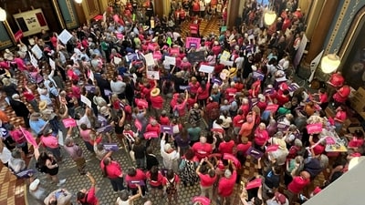 Iowa Democrat Jennifer Konfrst speaks to protesters rallying at the Iowa Capitol rotunda in opposition to the new ban on abortion after roughly six weeks of pregnancy introduced by Republican lawmakers in a special session on Tuesday, (AP)