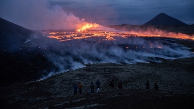 Lava emerges from a fissure of the Fagradalsfjall volcano near the Litli-Hrútur mountain, some 30 kilometers (19 miles) southwest of Reykjavik, Iceland, Monday July 10, 2023. Iceland opens access to volcanic eruption site as fumes subside, more visitors still expected (AP Photo/Marco Di Marco) Lava emerges from a fissure of the Fagradalsfjall volcano near the Litli-Hrútur mountain, some 30 kilometers (19 miles) southwest of Reykjavik, Iceland, Monday July 10, 2023. Iceland opens access to volcanic eruption site as fumes subside, more visitors still expected (AP Photo/Marco Di Marco)